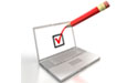 red pencil checking off checkbox on laptop